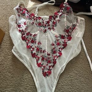 see through rosy lingerie bodysuit
